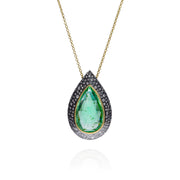 Todd Reed necklace with Green pear tourmaline (~8.39ct), white brilliant cut diamonds (~1.19ct), raw diamond cube (~.11ct), 18k yellow gold, 14k yellow gold, and sterling silver with patina